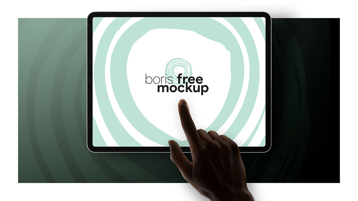 Free PSD finger pointing to iPad Pro screen mockup rendition image