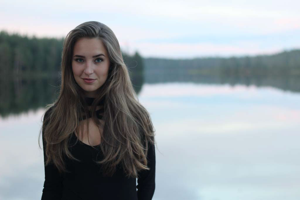 Portrait enhance - blonde girl near lake rendition image