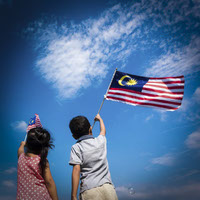 Children Waving Malaysian Flag