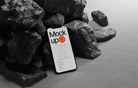 iPhone on Rock Mockup